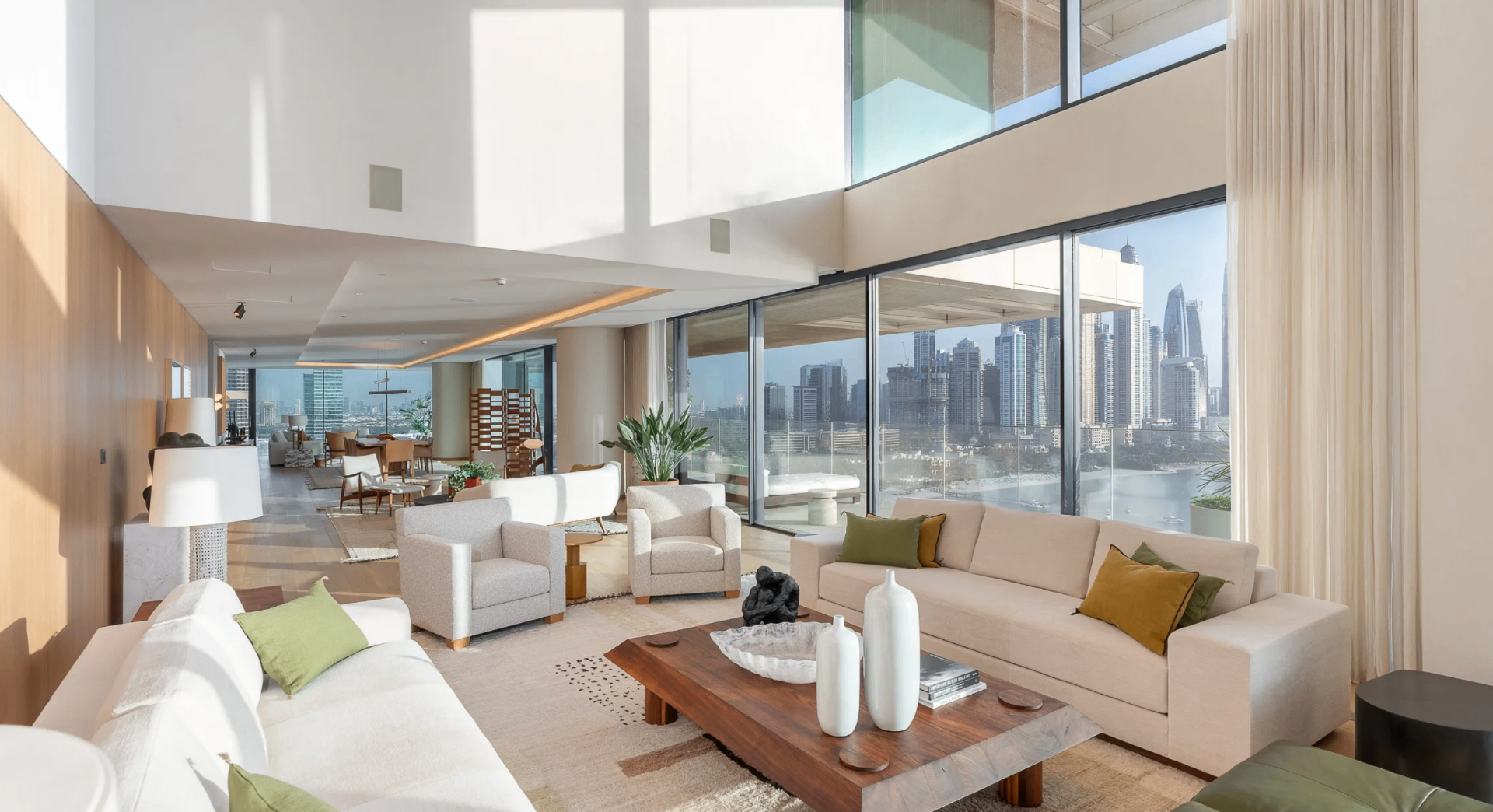 Double height penthouse living room with marina view