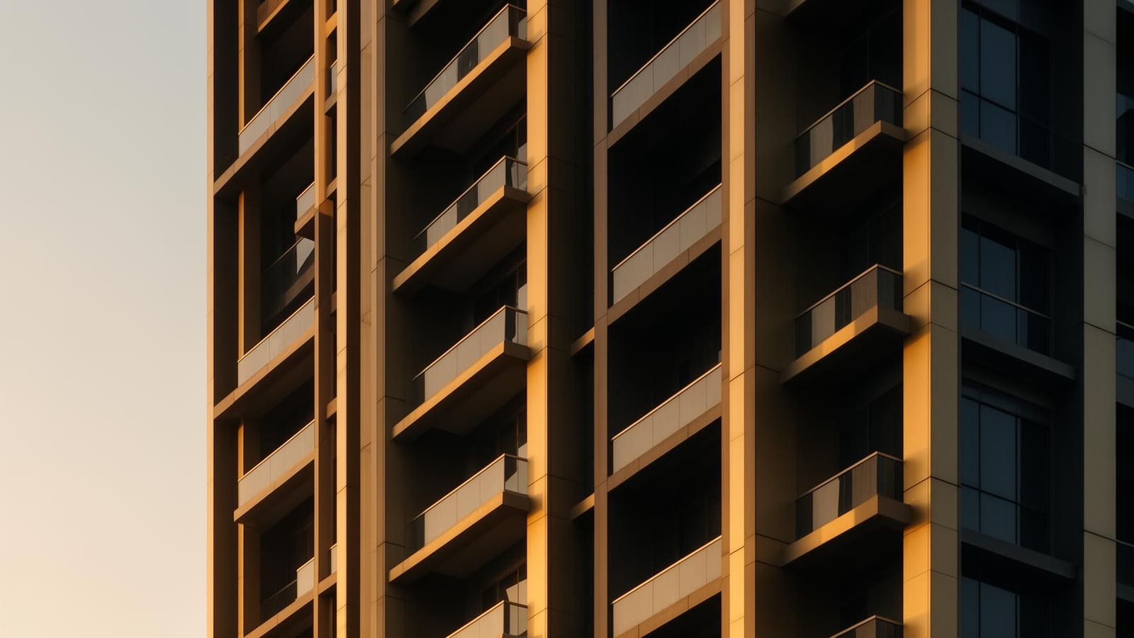 Luxury Dubai residential tower facade in warm afternoon light